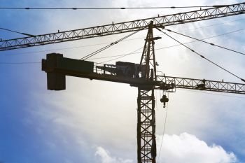 Construction site with crane, Industrial crane construction.