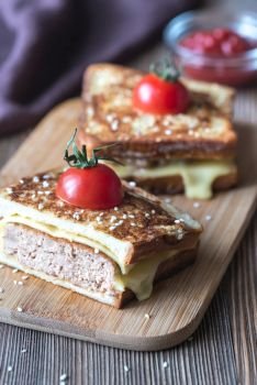 Cheeseburger french toasts on the wooden board