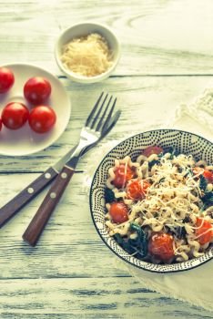 Pasta with spinach and cherry tomatoes