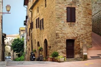 street old town San Gimignano at the  province of Siena. Tuscany, Italy

