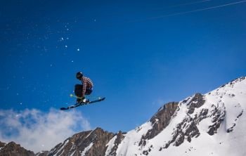 skier jumping on a snow park in Austrian alps
