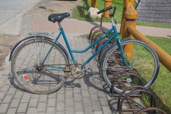 City Brenguli, Latvia. Old Ussr vintage retro bicycle at spring. Travel photo. 2018