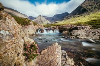 Beautiful landscape scenery with waterfalls in the mountains: The Fairy Pools, Isle of Skye, Scotland