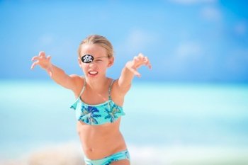 Cute little girl at beach during summer vacation. Adorable little girl at beach during summer vacation