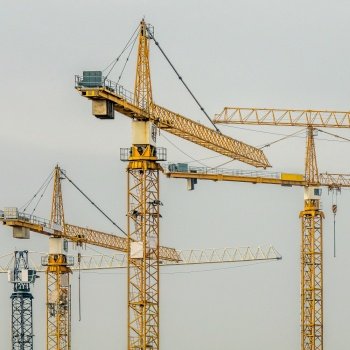 Several building cranes on a building site