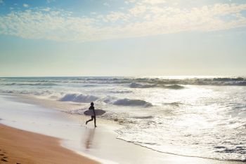 Surfing in the Atlanctic ocean. Algarve, Portugal