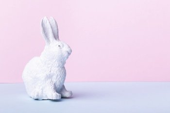 white easter bunny on colorful background, happy easter concept