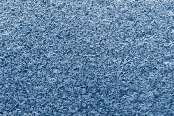 Textures and backgrounds: abstract winter pattern, seasonal background. Flat surface, covered with ice-like crystals of dried salt.. Abstract winter pattern