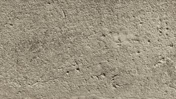 Texture of an old stone wall, close-up toned natural background