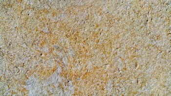 Texture of an old stone wall, close-up background