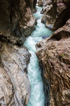Summer Liechtensteinklamm gorge with stream and waterfalls in Austria.