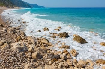 Beautiful summer Lefkada coast stony beach, Greece, Ionian Sea