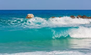 Sea surf wave and beautiful summer Lefkada coast view, Greece, Ionian Sea.