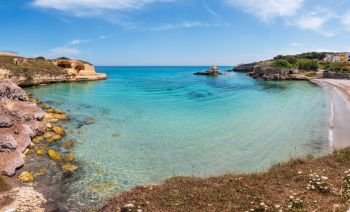 Beach Torre Sant’Andrea and islet Scoglio the Tafaluro, Otranto region, Salento Adriatic sea coast, Puglia, Italy