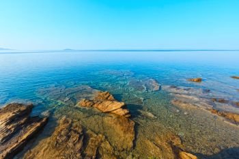 Morning Aegean Sea rocky coast view (Nikiti, Sithonia, Halkidiki, Greece).