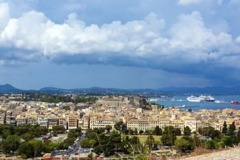 A picturesque view of the city of Corfu from the fortress of the Corfu town in Greece.. A picturesque view of the city of Corfu from the fortress of the Corfu town. Greece.