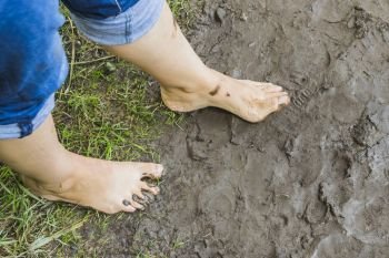 barefoot aerial view on mud surface in the forest