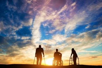 Three disabled people looking at the sunset. Idea of healing and hope. 3d illustration.. Three disabled people at the sunset.