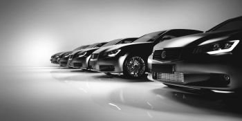 Black sedan cars standing in a row. Fleet of generic modern cars. Transportation. 3D illustration.. Black sedan cars standing in a row.