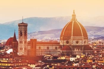 Skyline of Florence, Italy. Cathedral of Saint Mary of the Flowers at sunset. Vintage image of Cattedrale di Santa Maria del Fiore, Firenze. Skyline of Florence, Italy. Cathedral of Saint Mary of the Flowers at sunset.