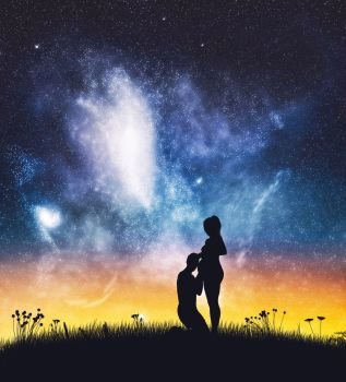 Man kissing pregnant woman’s belly on starry sky. Silhouettes on field at night. Expecting parents.. Man kissing pregnant woman’s belly on starry sky.