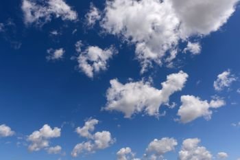 Beautiful white clouds with blue sky. Color shade gradient from white to blue for background wallpaper.