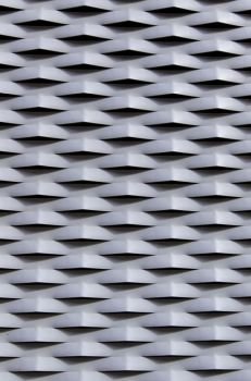 Metal protection grille with reliefs, safety detail and privacy