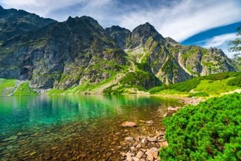 a small beautiful mountain lake Czarny Staw in the high Tatras on the territory of Poland
