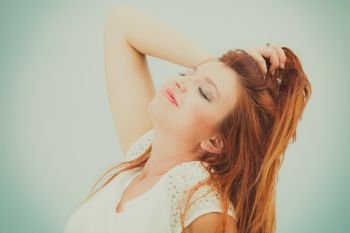 Beauty of ginger hair concept. Portrait of beautiful happy redhead adult woman.. Portrait of beautiful redhead adult woman