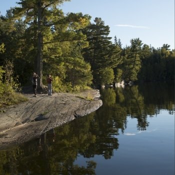Tourists at the lakeside, Lake of The Woods, Ontario, Canada