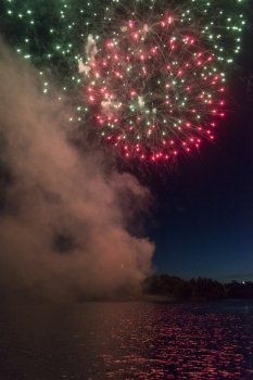 Fireworks display at night on Canada Day, Kenora, Lake Of The Woods, Ontario, Canada