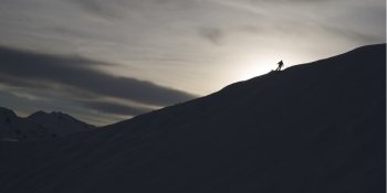 Silhouette of skier on mountain,  Kicking Horse Mountain Resort, Golden, British Columbia, Canada