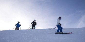Tourists skiing,  Kicking Horse Mountain Resort, Golden, British Columbia, Canada