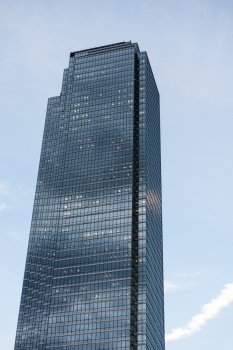 Low angle view of a modern skyscraper, West End, Dallas, Texas, USA