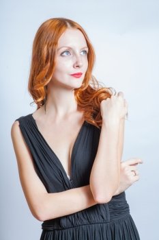 redhead in studio, waist up shot