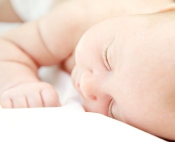 Closeup portrait of cute little baby sleeping