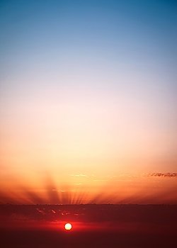 Sunset sky background, red sun down, beauty of nature, amazing panoramic view with copy space