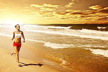 Healthy woman running on the beach, girl doing sport outdoor, happy female exercising, freedom, vacation, fitness and heath care concept with copy space over natural warm sunset background