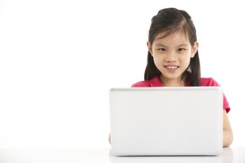 Studio Shot Of Chinese Girl With Laptop