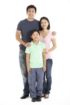 Full Length Studio Shot Of Chinese Family