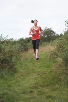 Woman On Run In Countryside