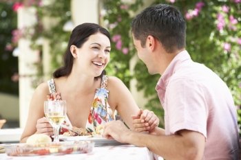 Couple Enjoying Meal outdoorss