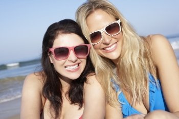 Two Women Enjoying Beach Holiday