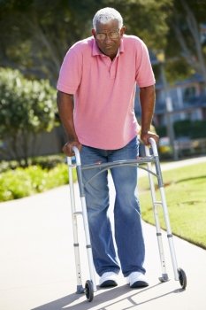 Senior Man With Walking Frame