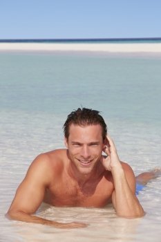 Man Relaxing In Sea On Beach Tropical Beach