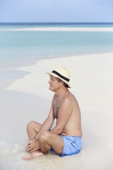 Senior Man Enjoying Beach Holiday