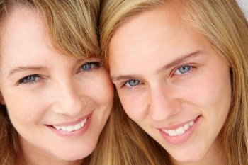 Close up mother with teenage daughter