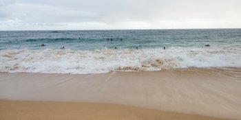 Surfers on the beach, Sandy Beach, Hawaii Kai, Honolulu, Oahu, Hawaii, USA