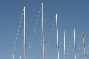 Low angle view of sailboat masts, Riverton, Hecla Grindstone Provincial Park, Manitoba, Canada