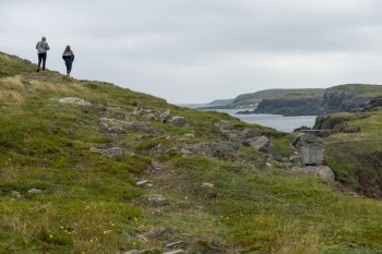 Tourists at North Bird Island, Bonavista Peninsula, Newfoundland And Labrador, Canada